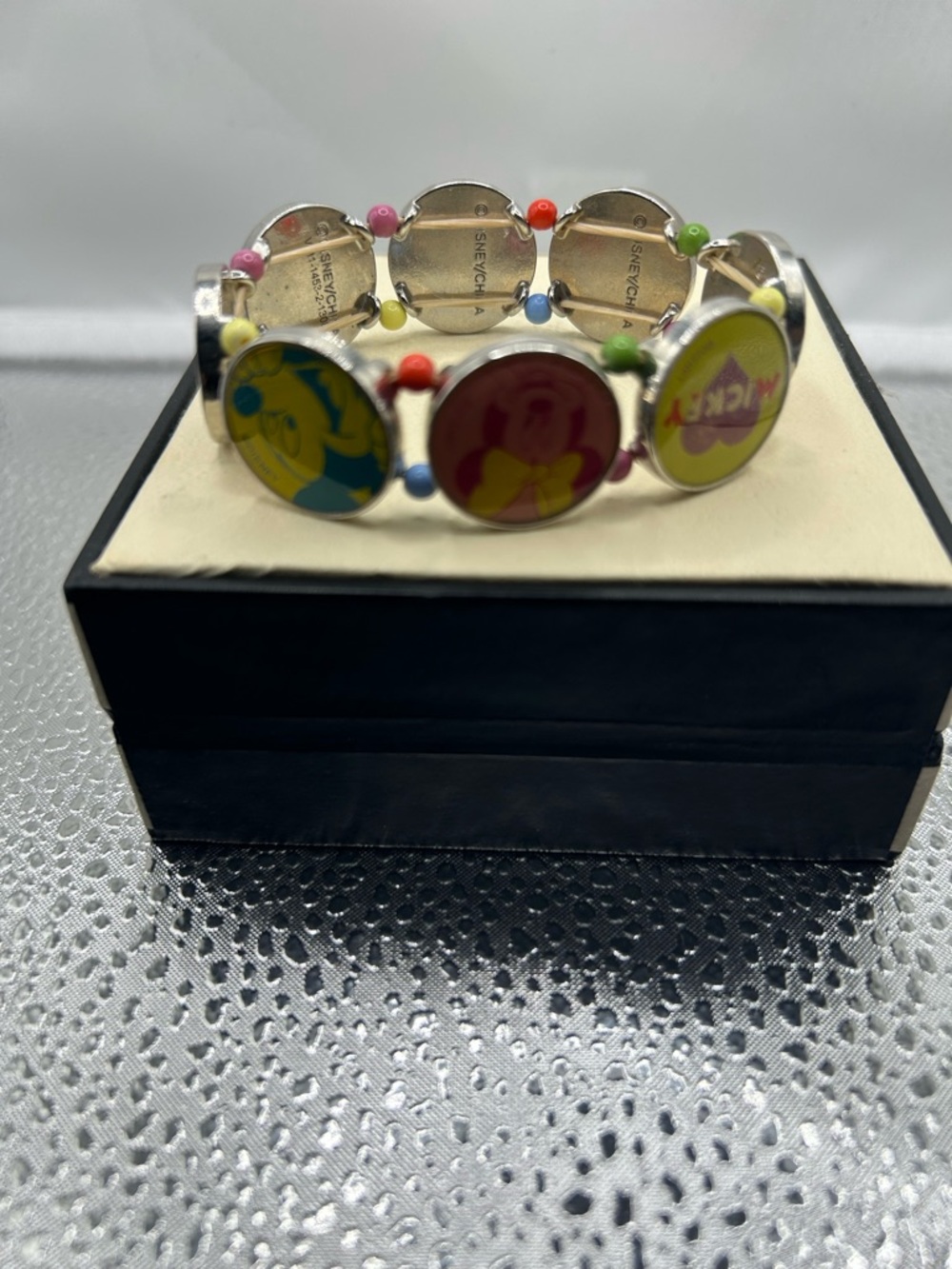 Disney character charm bracelet stretch multicolored novelty collectible